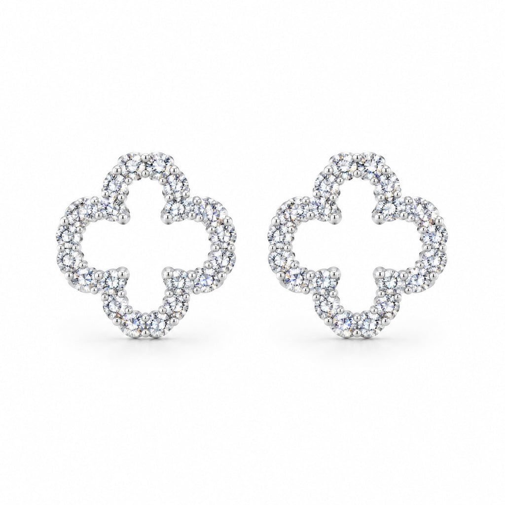 Pair of open clover outline earrings set with moissanite