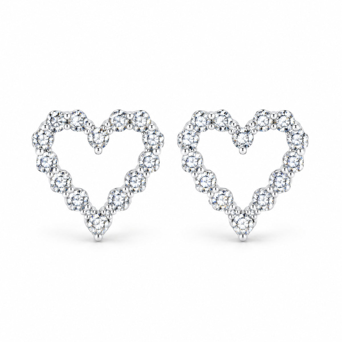 Pair of open heart outline earrings set with moissanite
