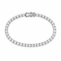 4mm moissanite tennis bracelet laid flat in an oval, clasp at the top