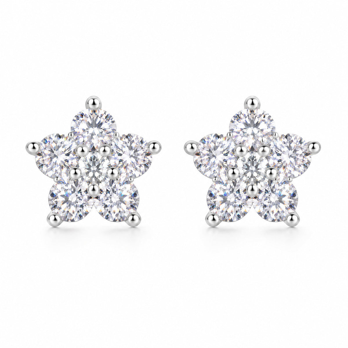 Pair of star-shaped moissanite cluster stud earrings