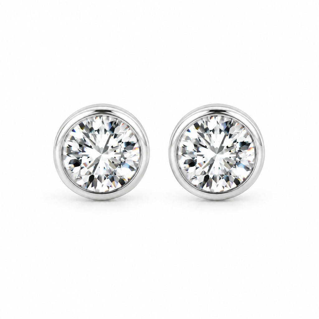 Pair of round moissanite solitaire studs, front view