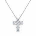 Slim cross pendant with square moissanite stones on a fine chain