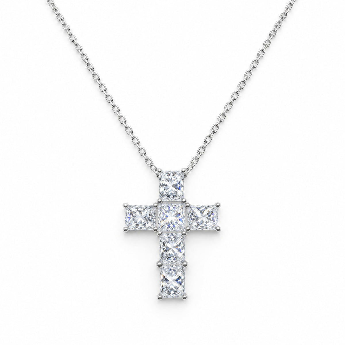 Slim cross pendant with square moissanite stones on a fine chain