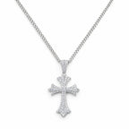 Floral-tip cross pendant hanging from its chain