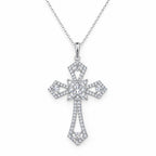Front view of the statement cross pendant on a fine chain