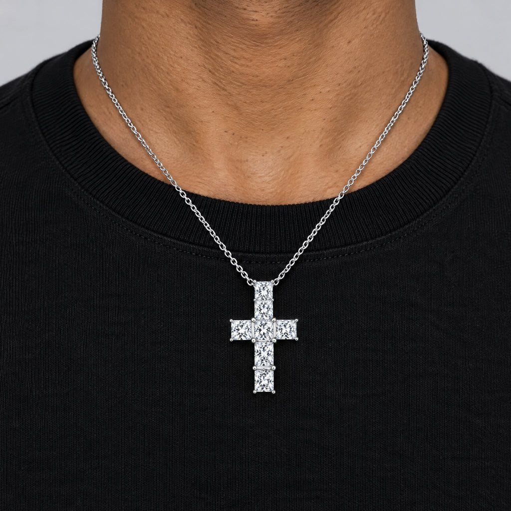 Man in a black T-shirt wearing the slim cross pendant