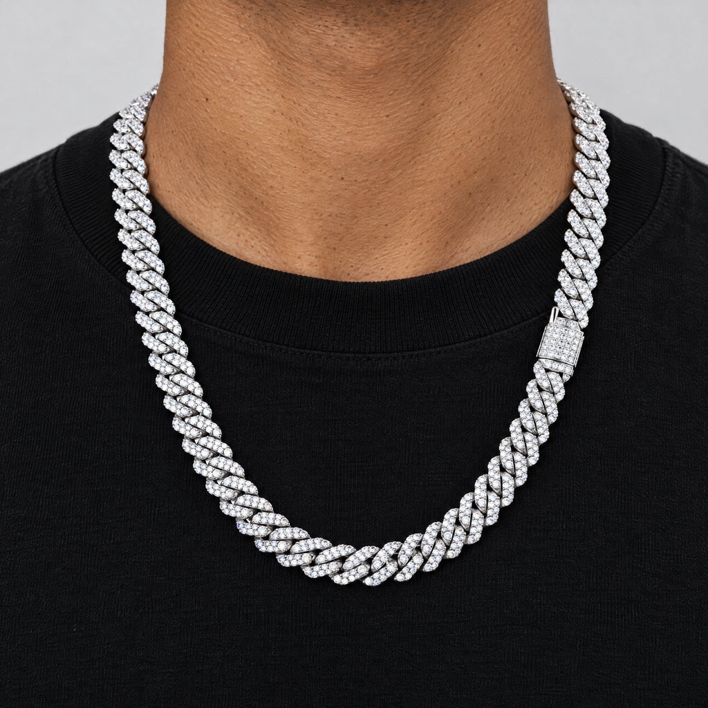 Man in a black T-shirt wearing a 10mm iced Cuban link chain