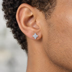 Kite cluster stud earring worn on the earlobe