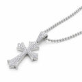 Floral-tip cross pendant covered in pavé moissanite on its chain