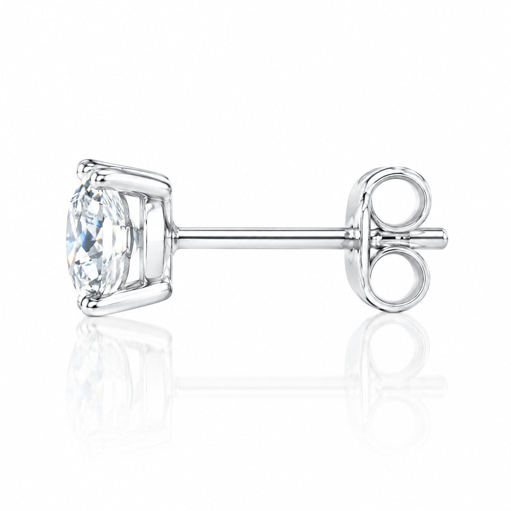 Side view of a round four-prong stud earring with its butterfly back