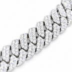 Close-up of iced Cuban links set with moissanite