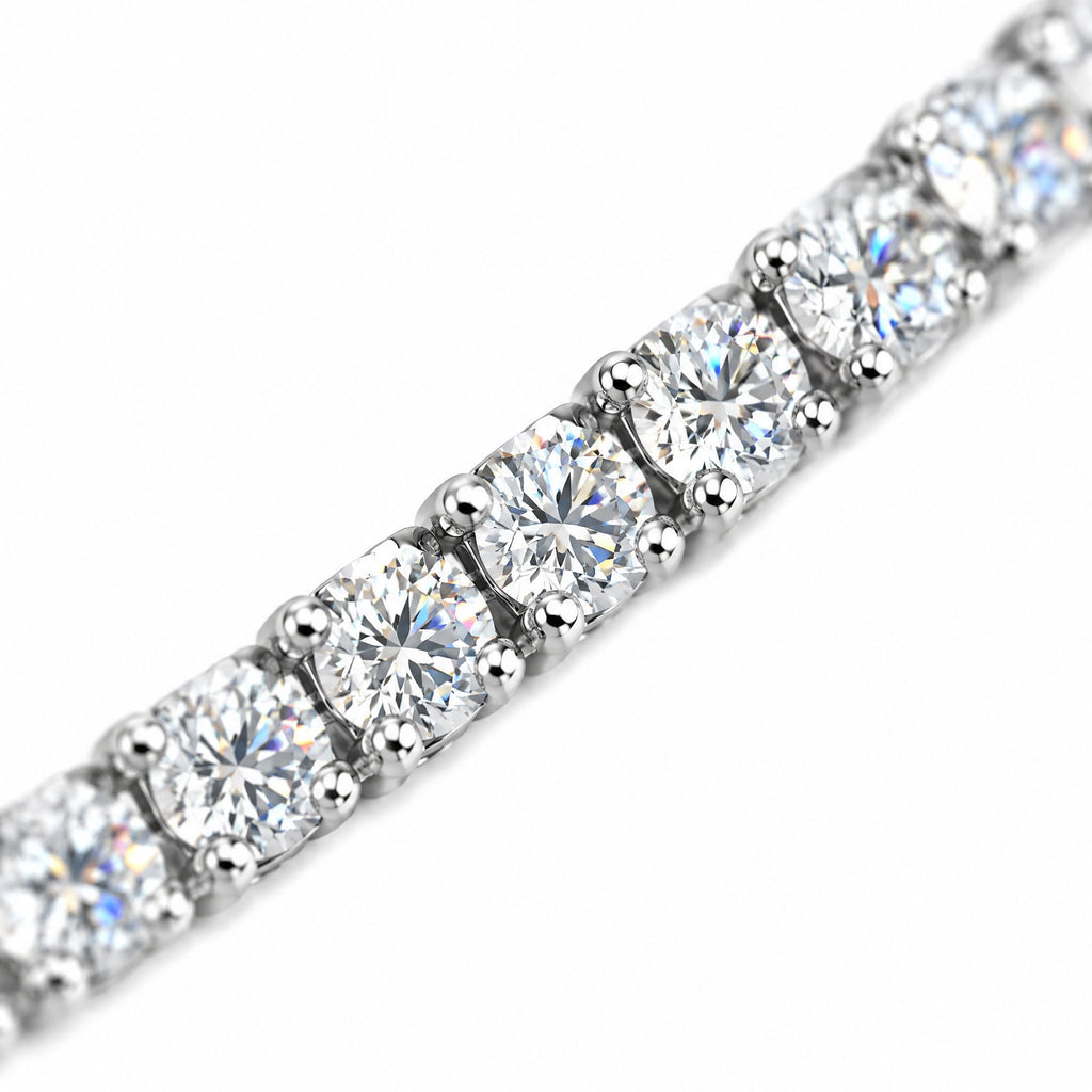 Close-up of round four-prong moissanite stones on the 3mm tennis chain