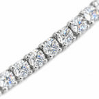 Close-up of round four-prong moissanite stones on the 3mm tennis chain