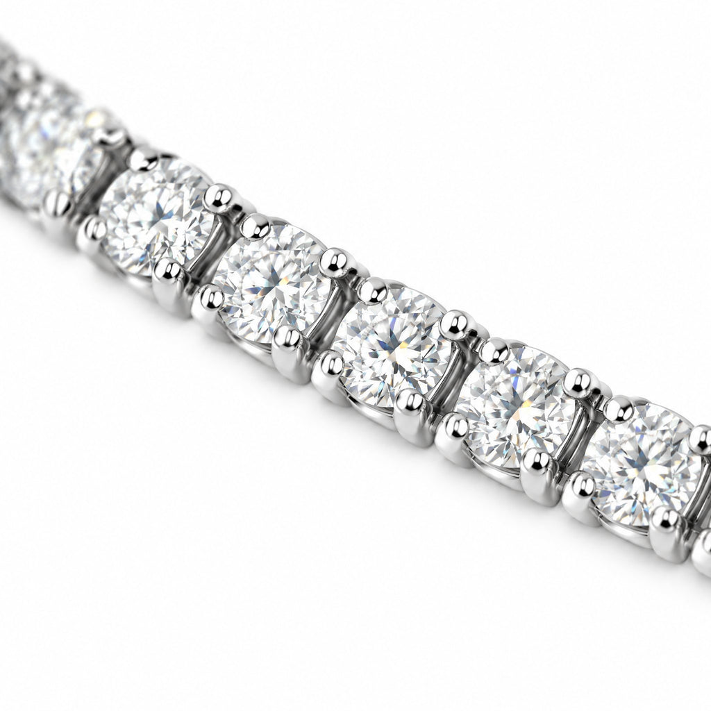 Close-up of four-prong round moissanite stones on the 3mm tennis bracelet