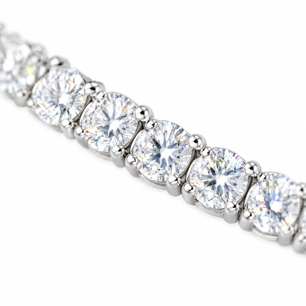 Close-up of large round four-prong moissanite stones on the 5mm bracelet