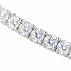 Close-up of large round four-prong moissanite stones on the 5mm bracelet
