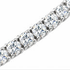 Close-up of round four-prong moissanite stones on the 5mm tennis chain