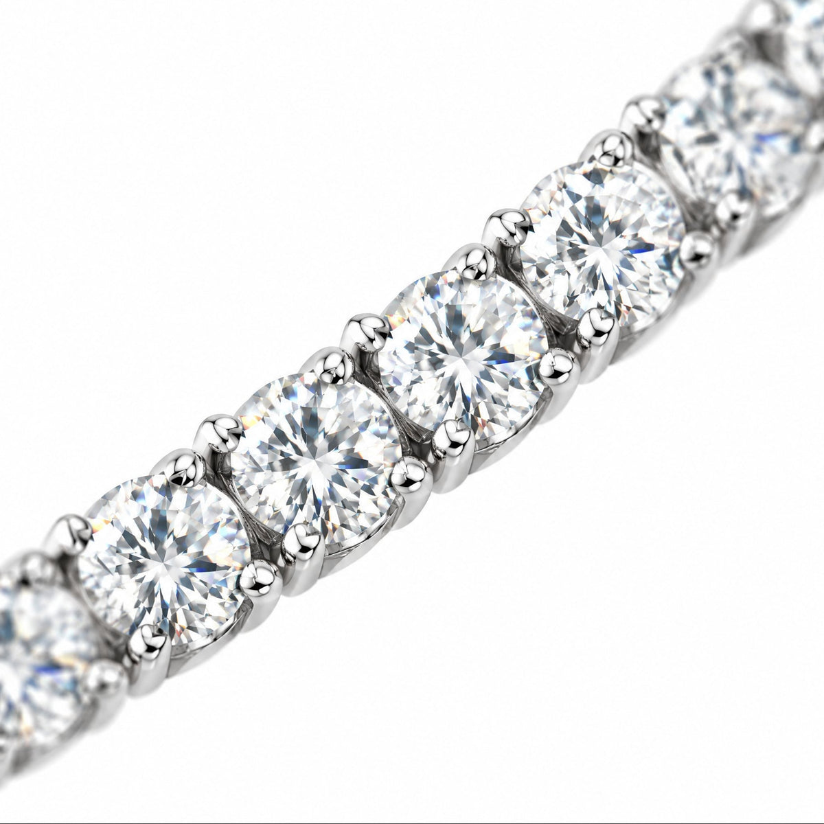 Close-up of round four-prong moissanite stones on the 5mm tennis chain