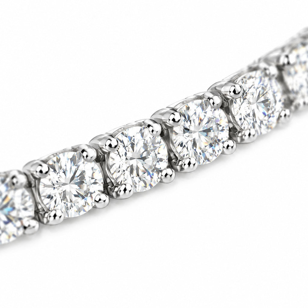 Close-up of round four-prong moissanite stones on the 4mm tennis bracelet