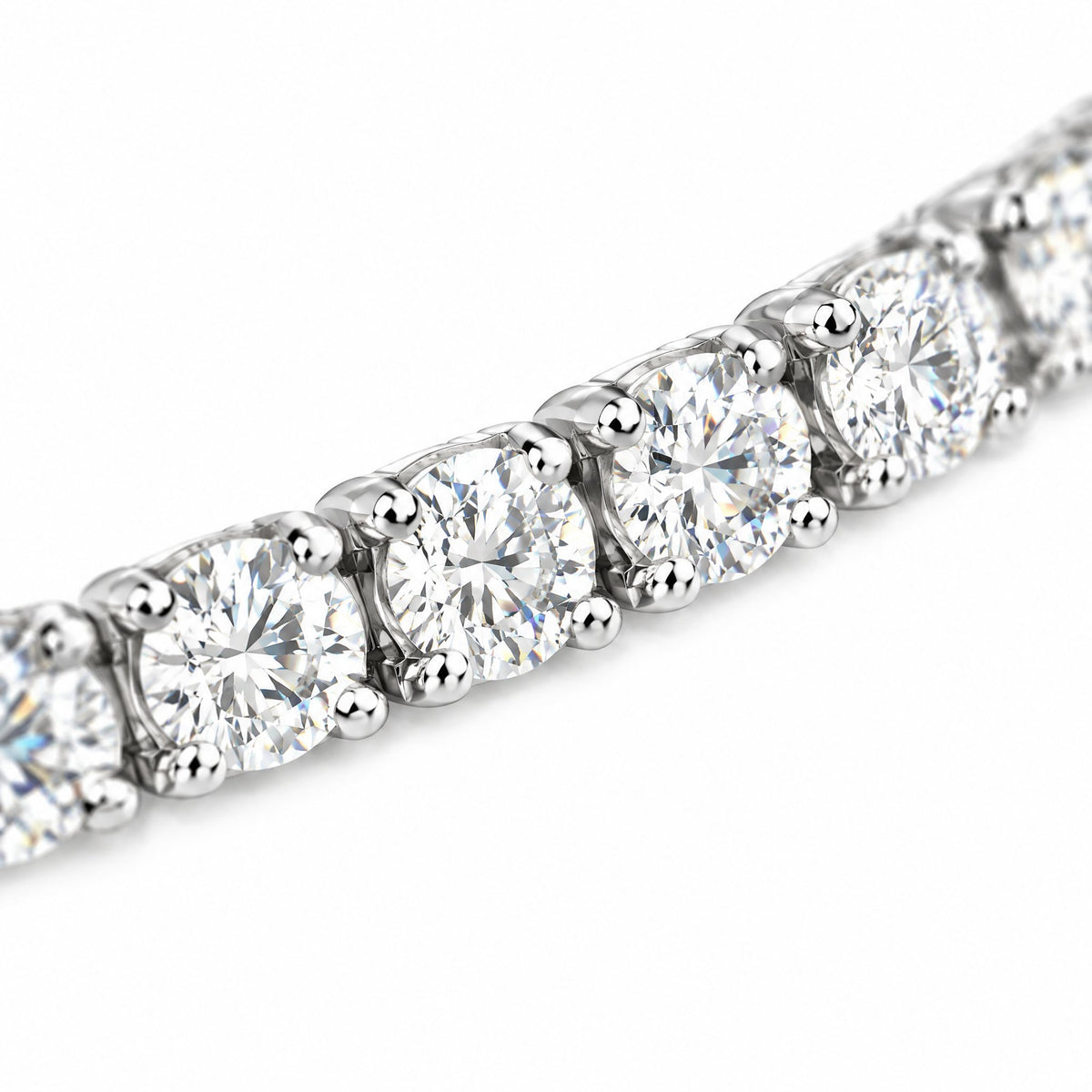 Close-up of round four-prong moissanite stones on the 4mm tennis bracelet