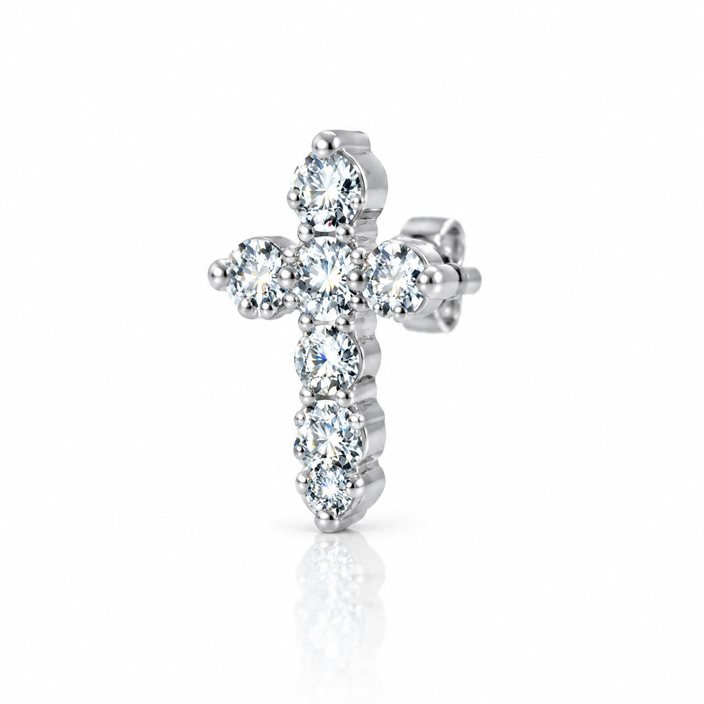 Single cross stud earring at an angle