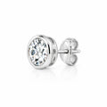 Round moissanite solitaire stud earring in a bezel setting, side angle