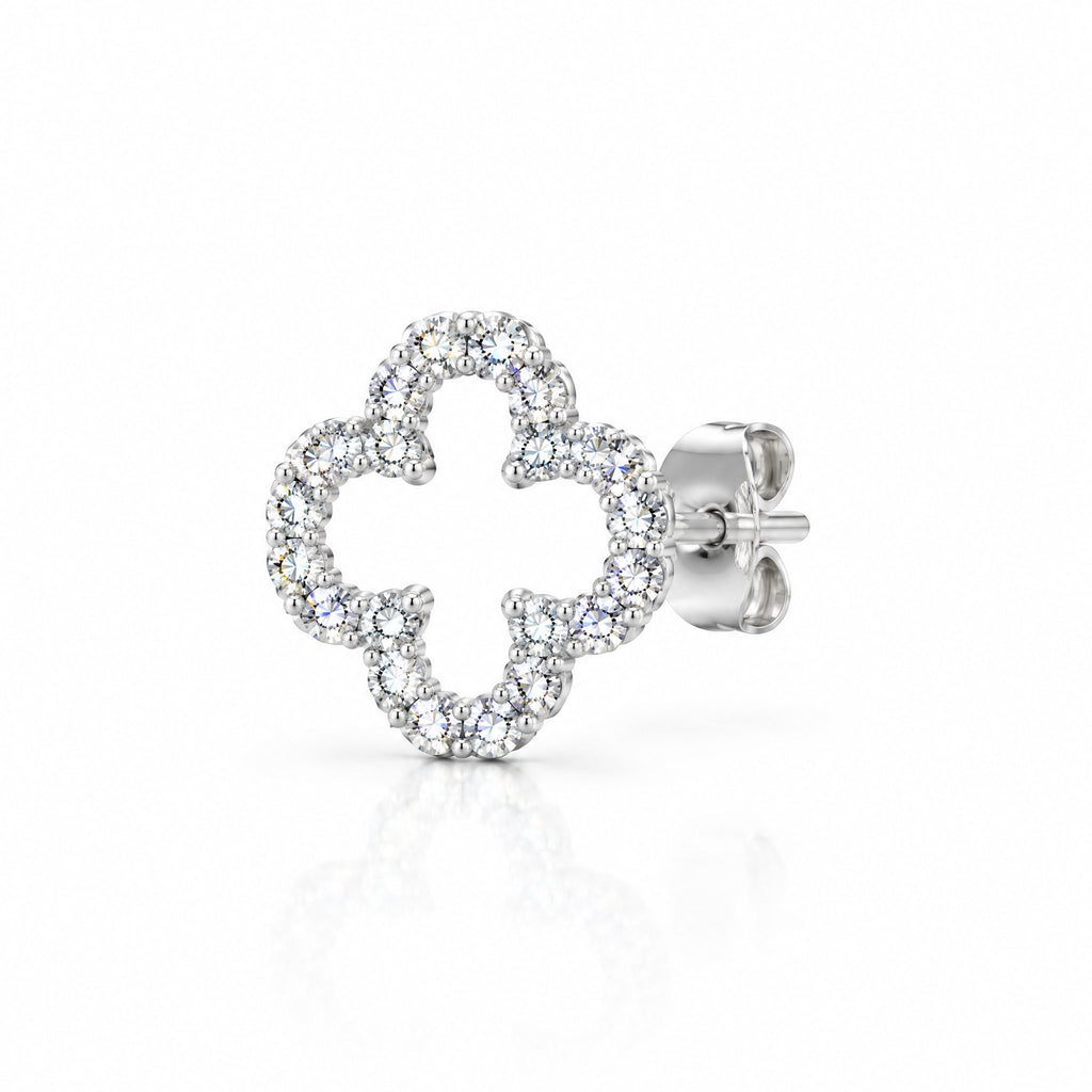 Single clover outline earring at an angle