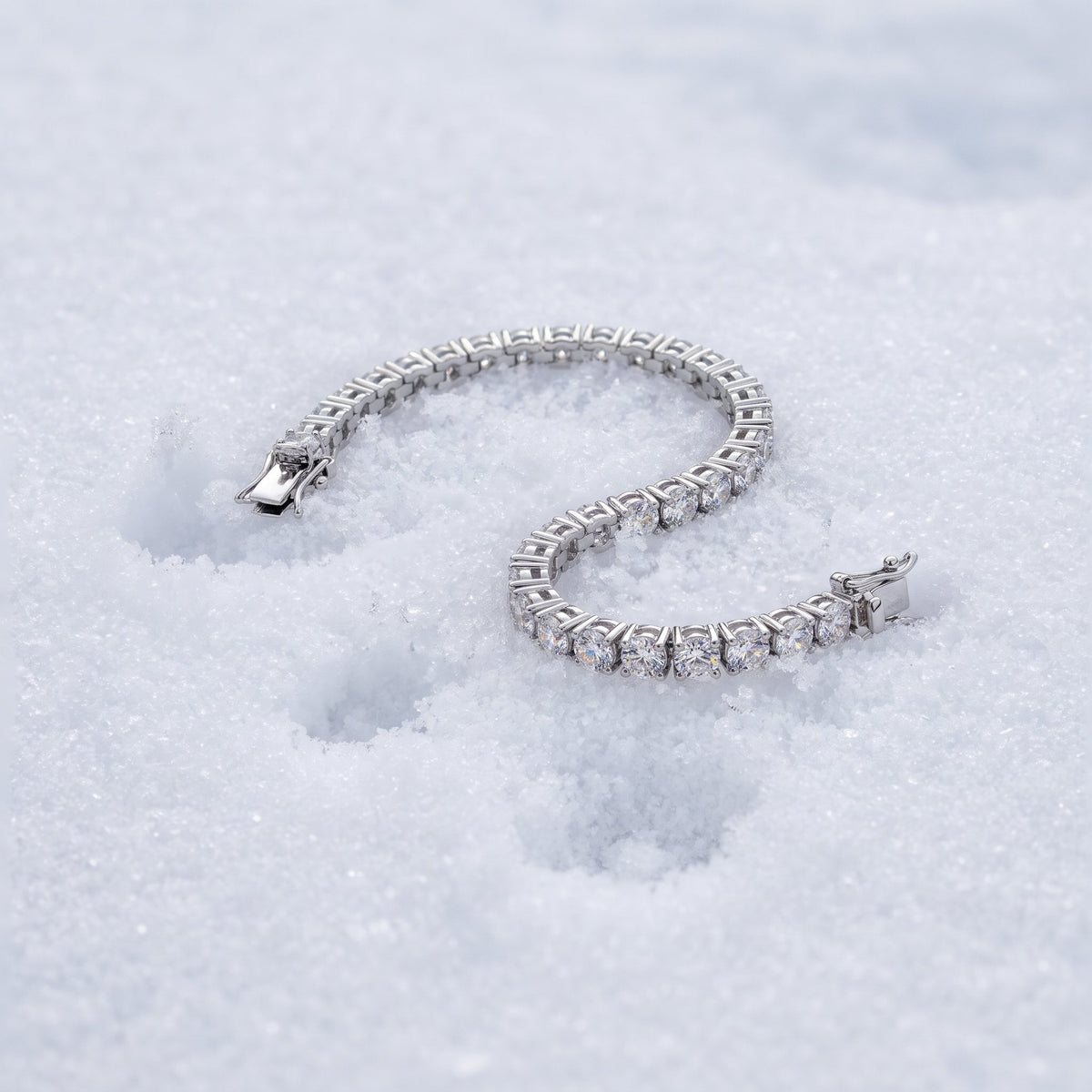 3mm tennis bracelet lying on snow