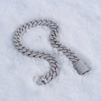 8mm Cuban link bracelet curved across fresh snow