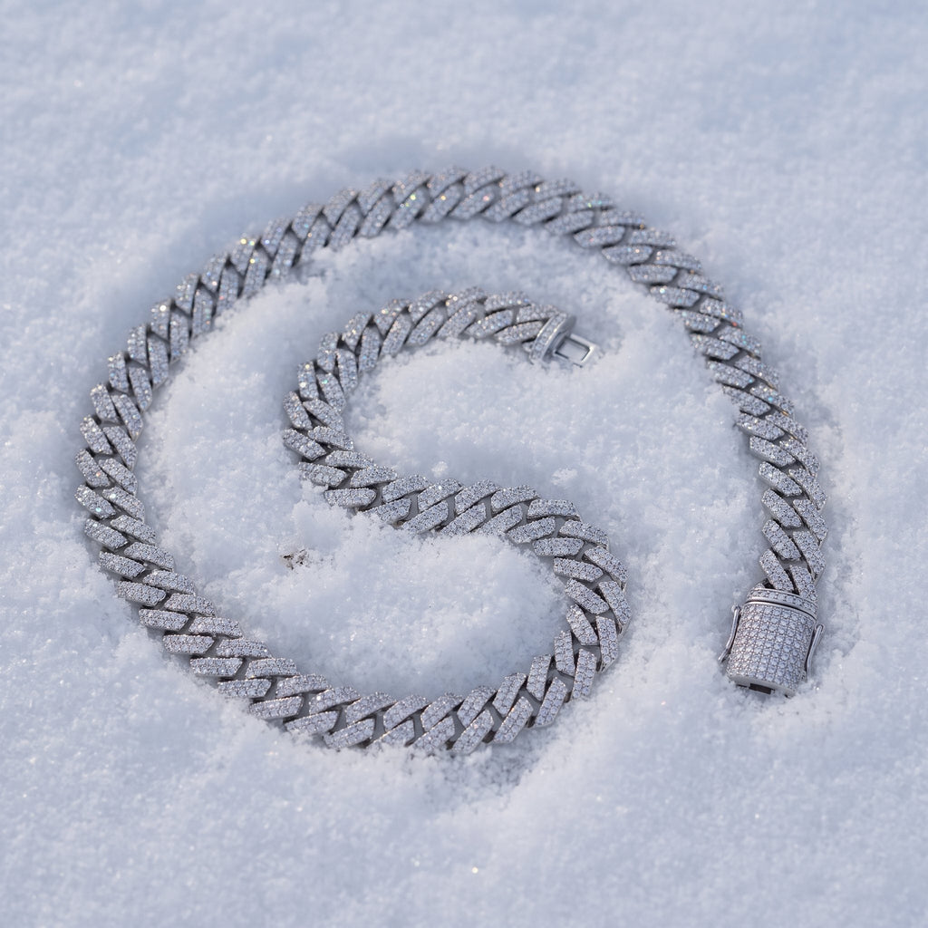 8mm Cuban link chain coiled on snow