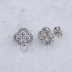 Pair of clover cluster studs on snow