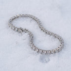 4mm tennis bracelet curved across snow