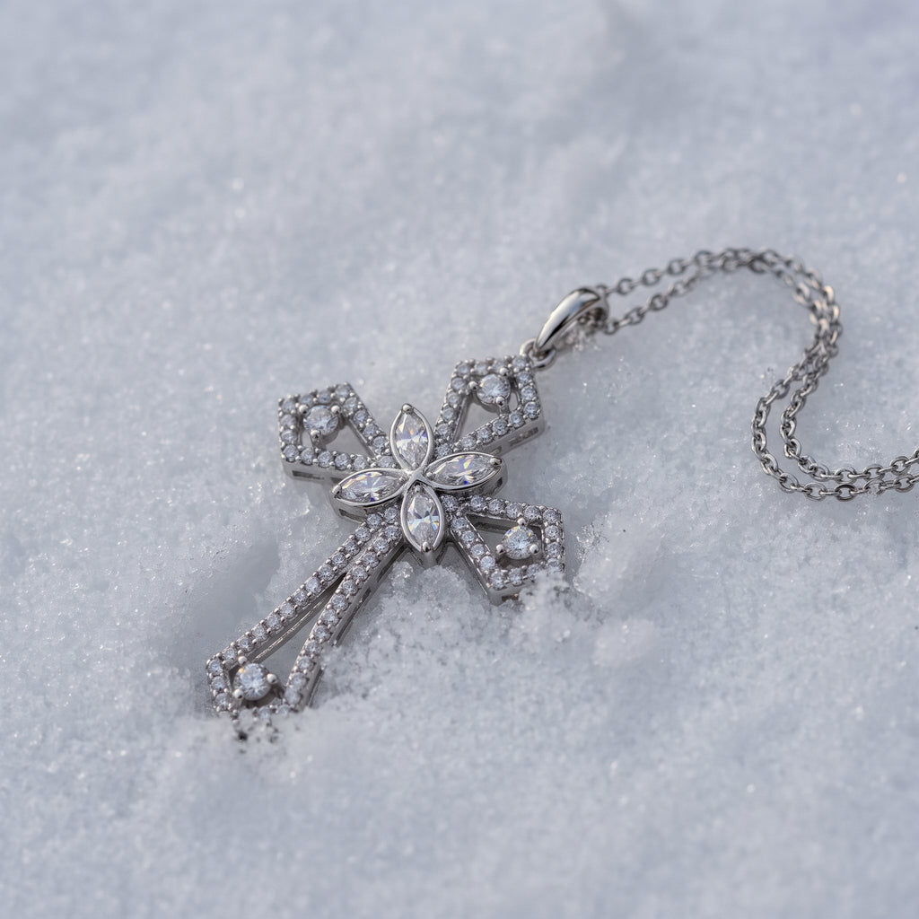 Statement cross pendant lying on snow