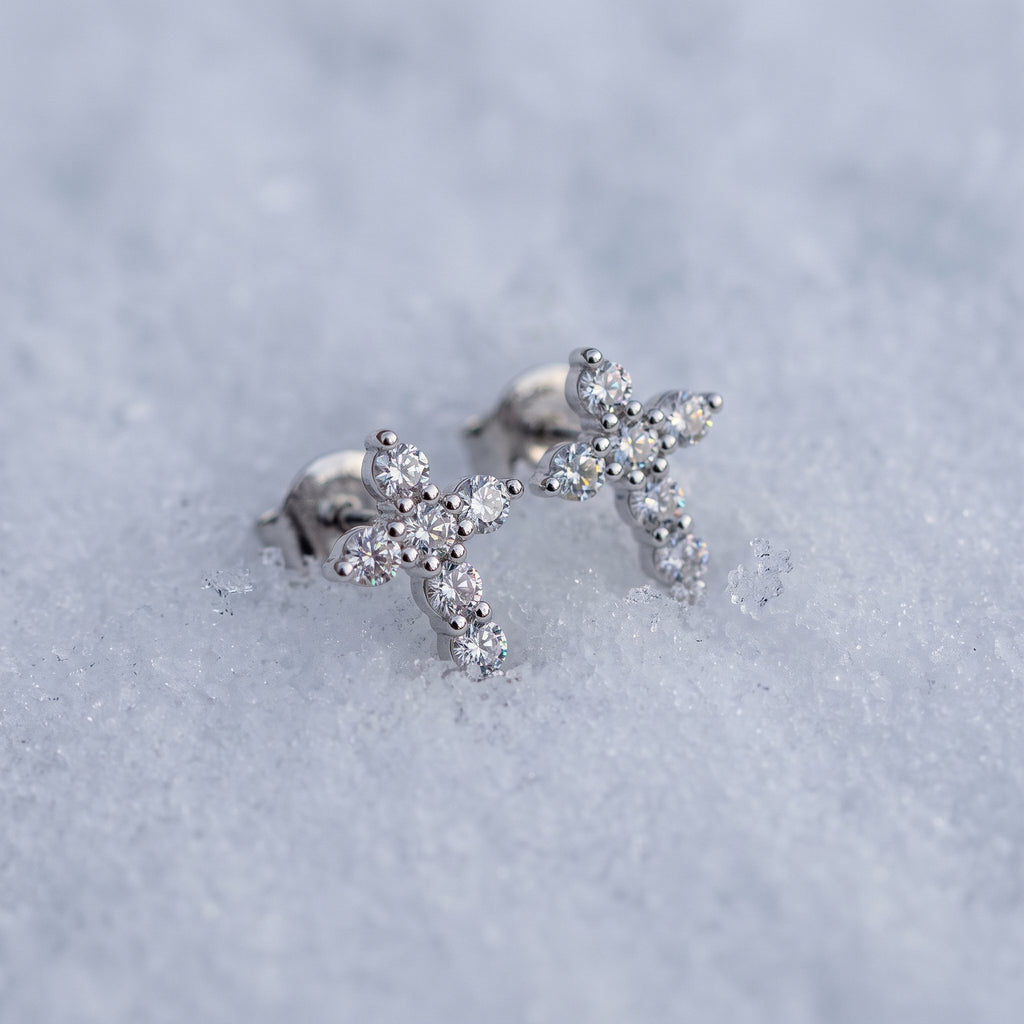Pair of cross studs on snow