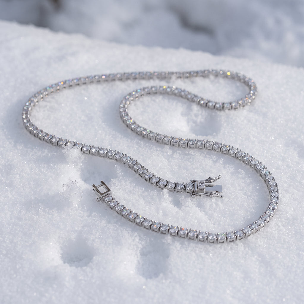 3mm tennis chain draped across snow