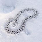 10mm Cuban link chain lying on snow